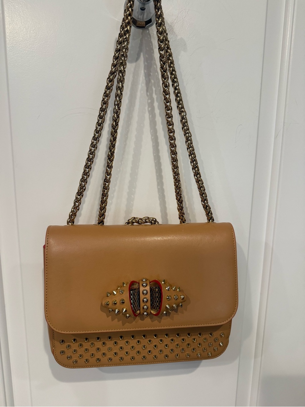 Christian Louboutin Sweet Charity small studded chain shoulder bag.